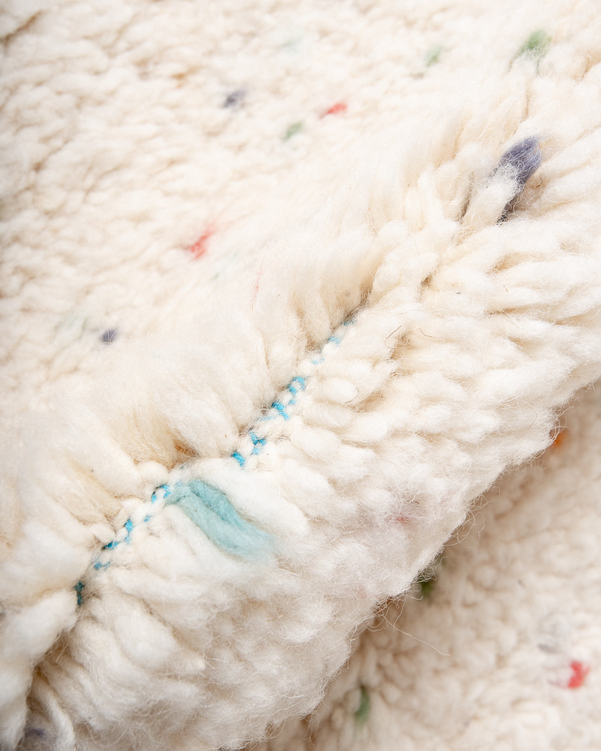 Modern, designer, handcrafted Berber rug from Morocco. Beniourain carpet with beautiful colours and patterns and fluffy wool texture.